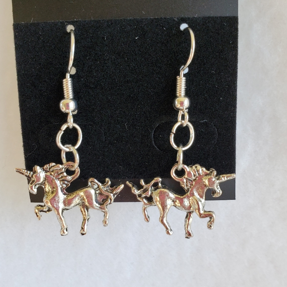 Women's silver unicorn hook earrings